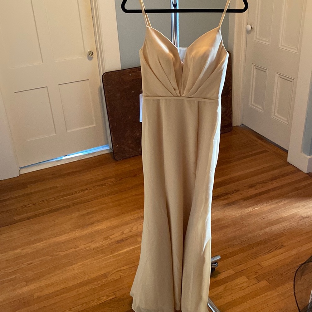 Never worn beautiful gold gown size 0.